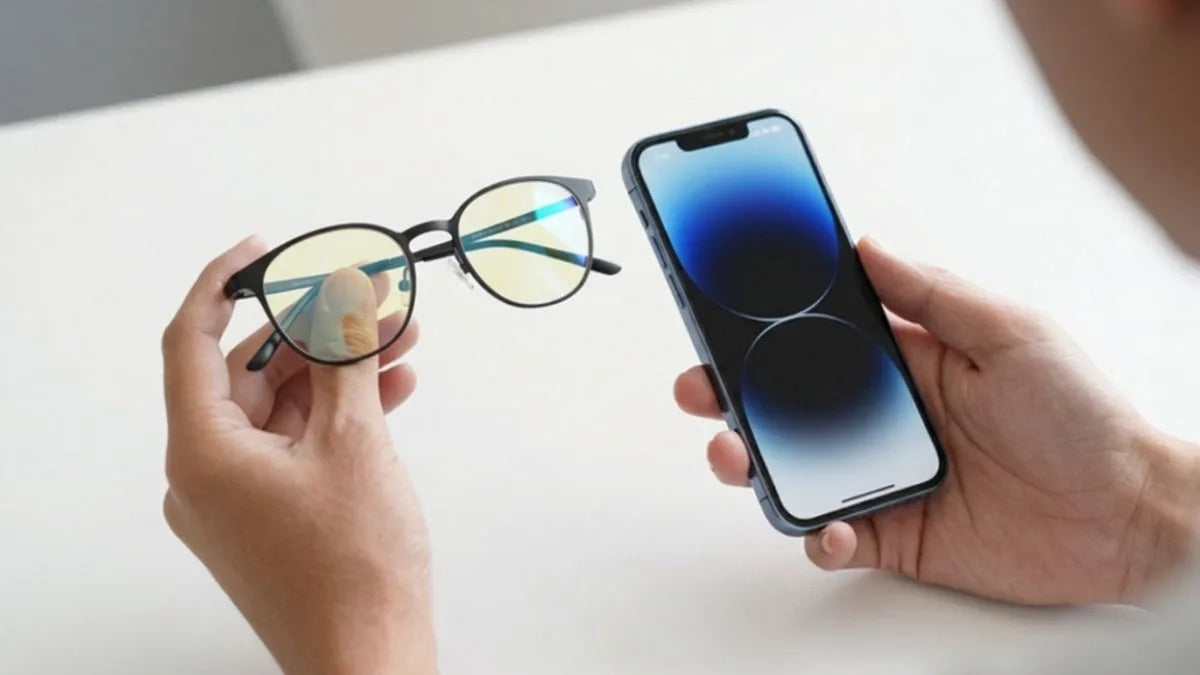 Person comparing blue light glasses and a phone screen protector