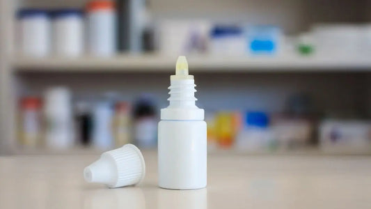 Eye drop bottles on shelf