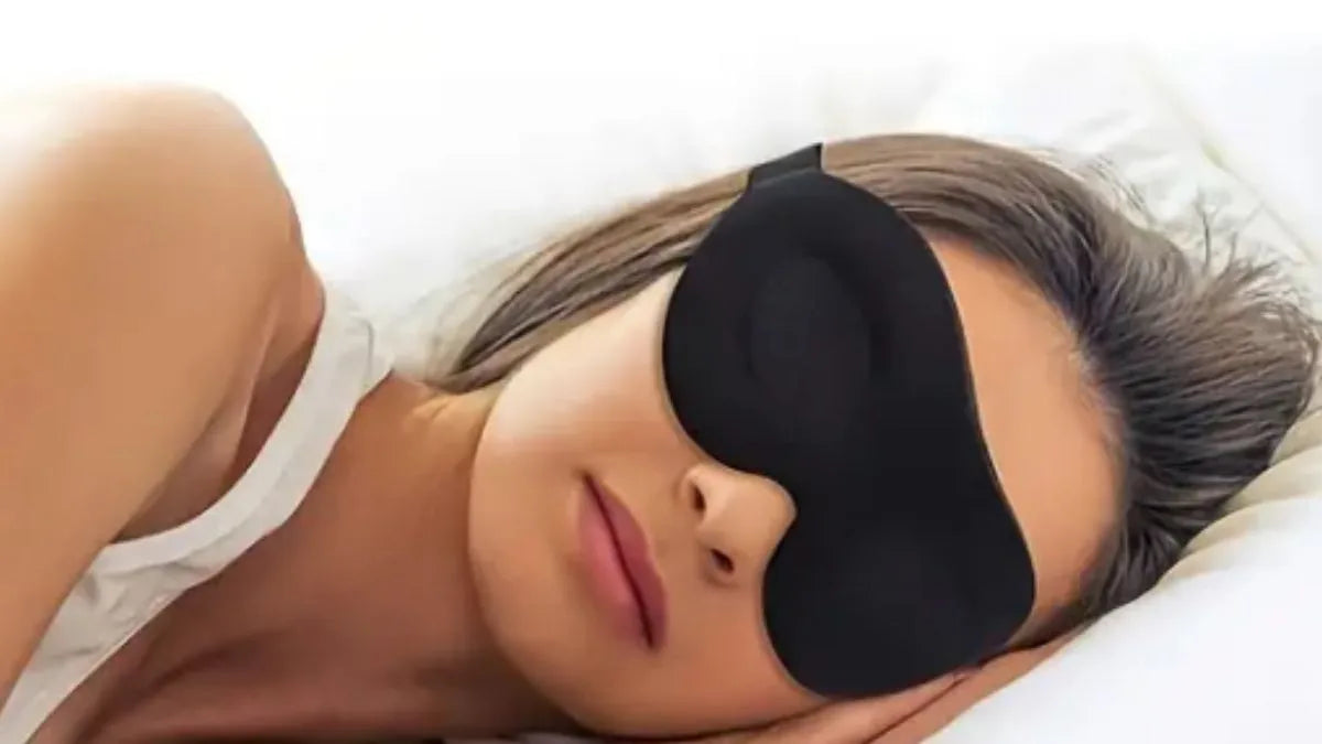 Person wearing a blackout sleep mask