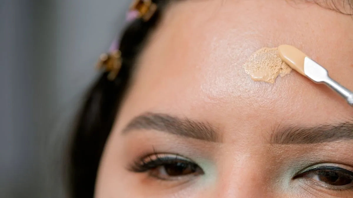 Applying foundation to a mature eye area skincare